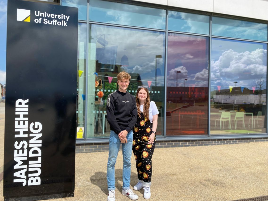 President of the Student Union Lewis Woolston and President of Activities and Wellbeing Katie Pickard standing in front of Mix