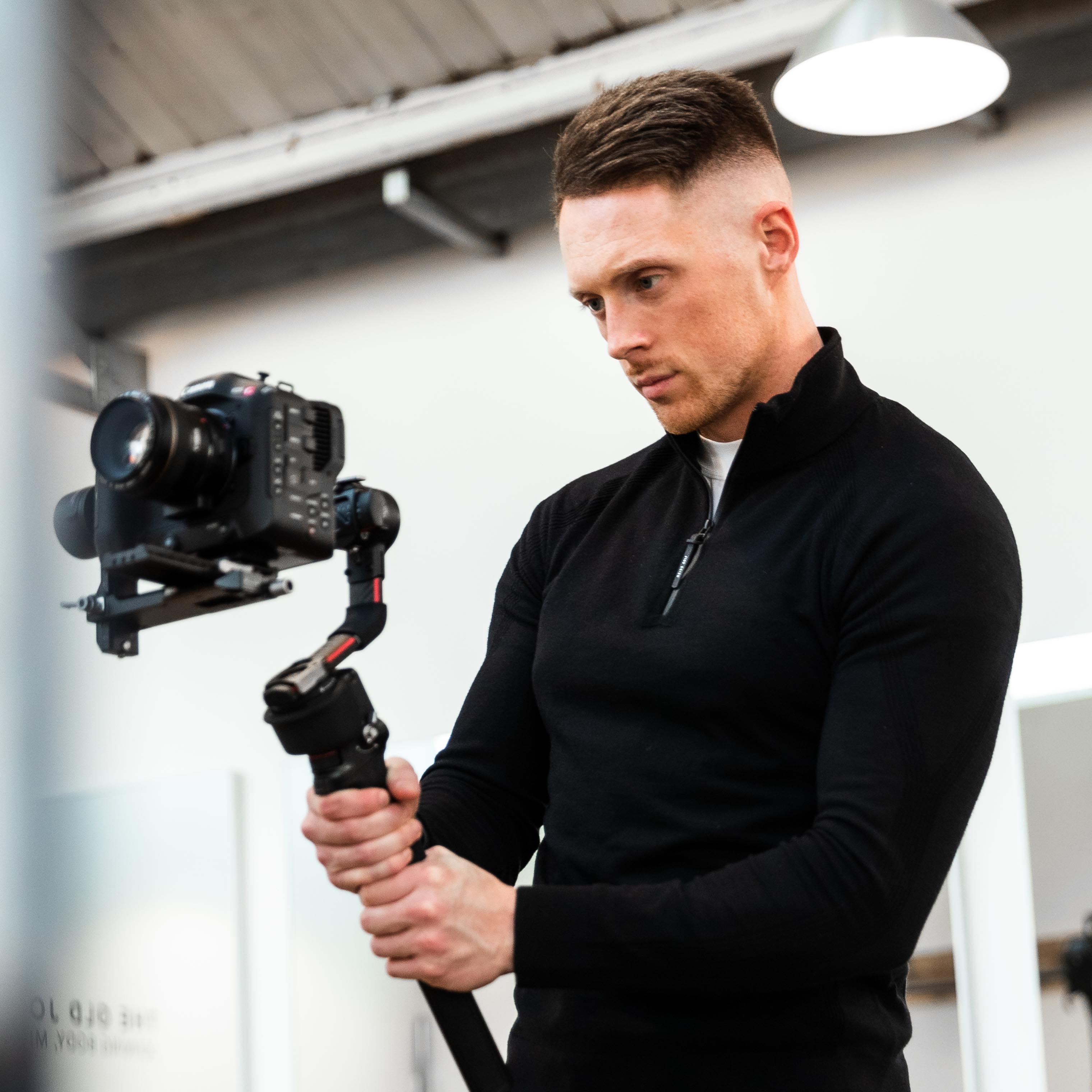 Luke Pyett holding a video camera